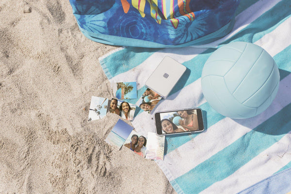  Lifeprint printer and photos on beach scene